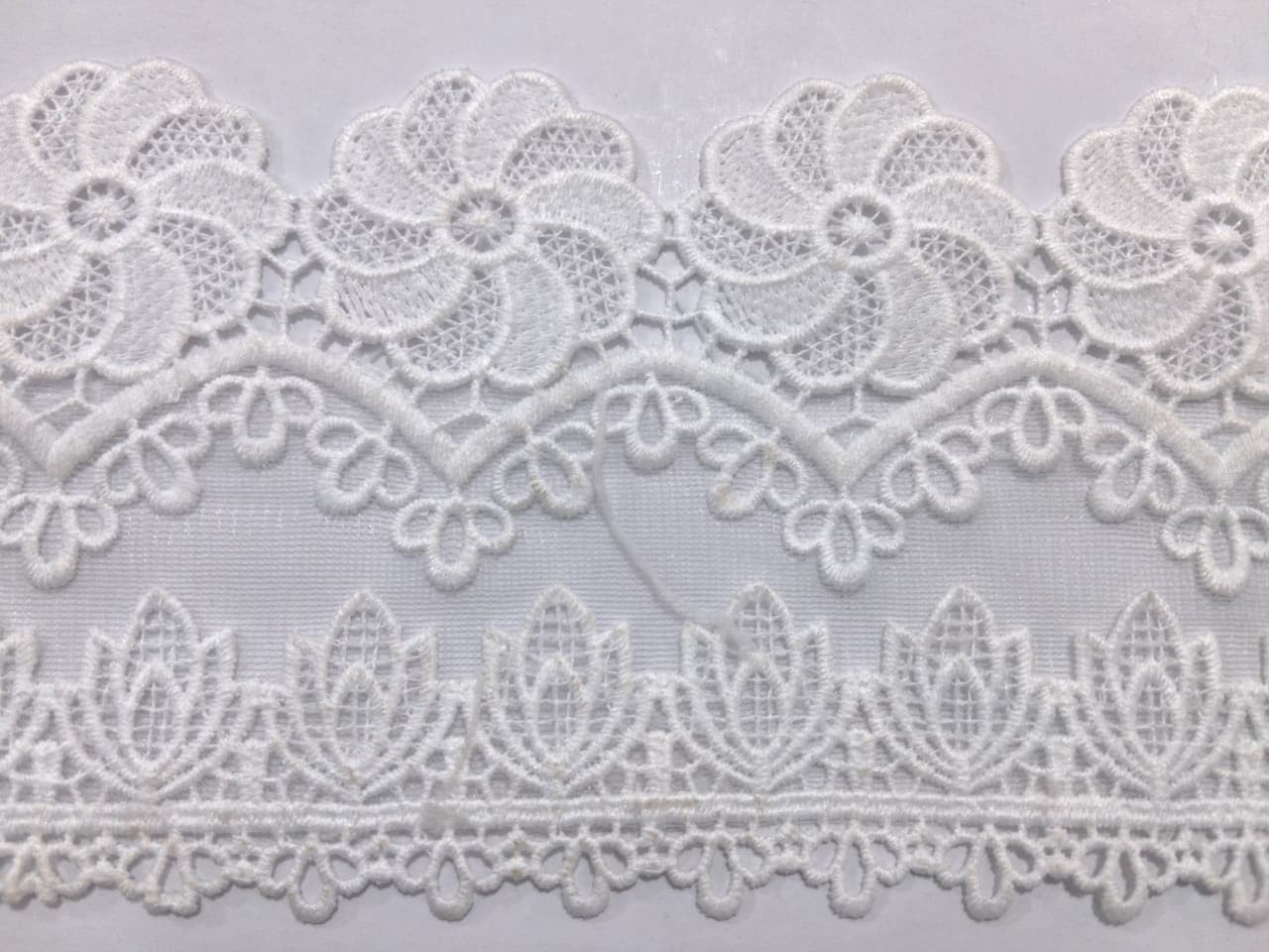 3D Milky White Lace Flower Design. Lace size is approximately 4.25-4.5 inches. Lace is vailable as per yard.