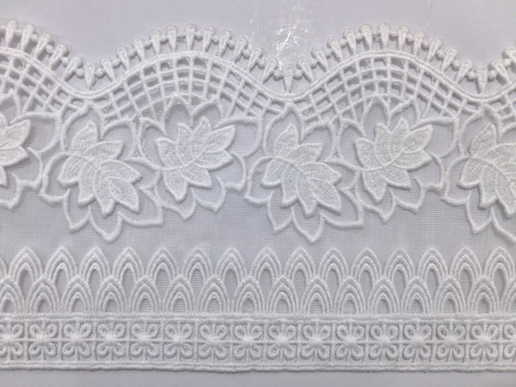3D Milky White Lace. Lace size is approximately 4.25-4.95 inches. Lace is available as per yard.