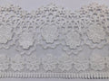 3D Milky White Lace. Lace size is approximately 4.85-5 inches. Lace is available as per yard