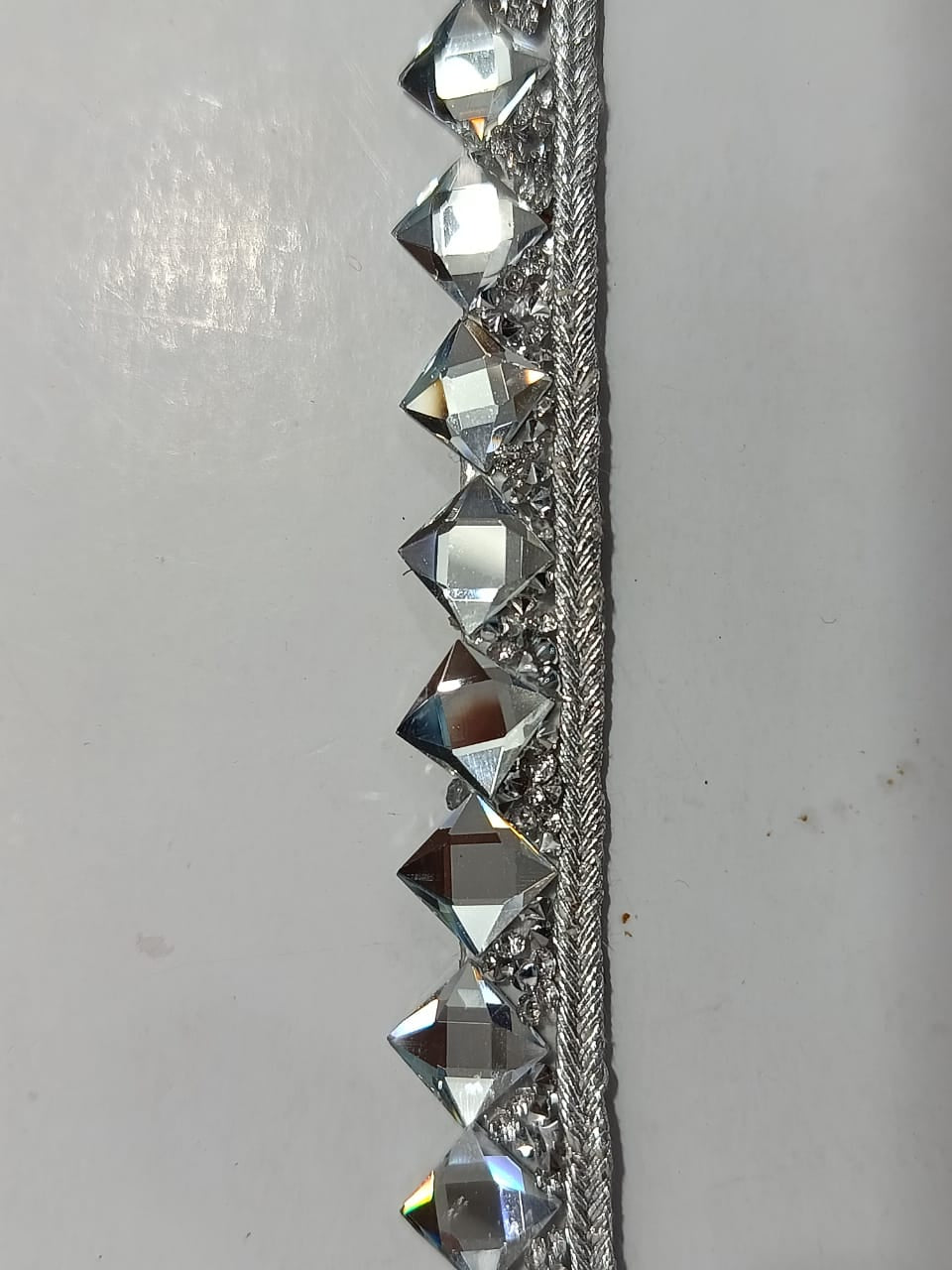 Fancy Crystal Stone Lace. Lace is available in 3 colours. Lace is available as per yard.