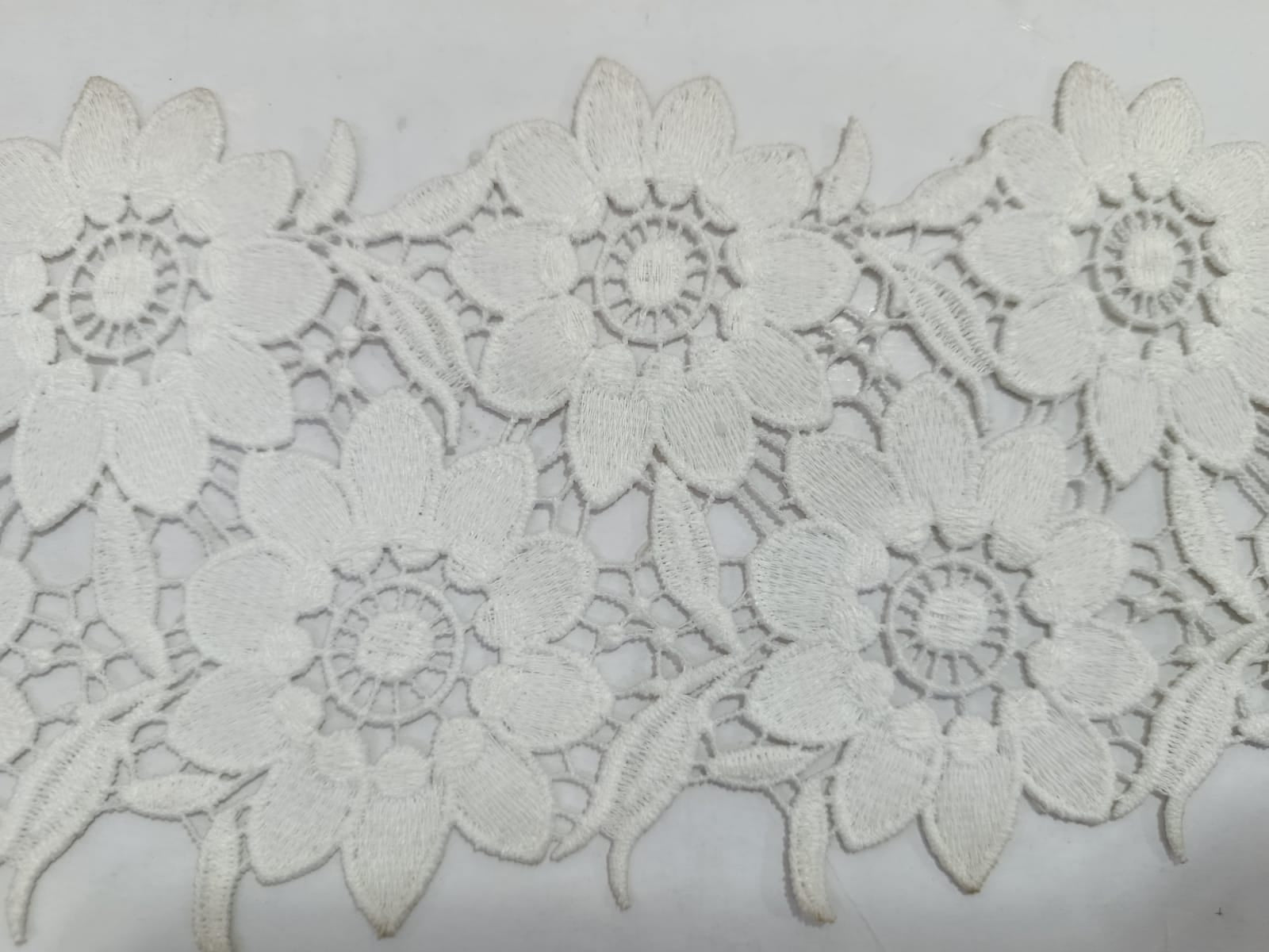 Milky WHite Flower Design Lace. Lace is approximately 4.75-5 inches. Lace is available as per yard.
