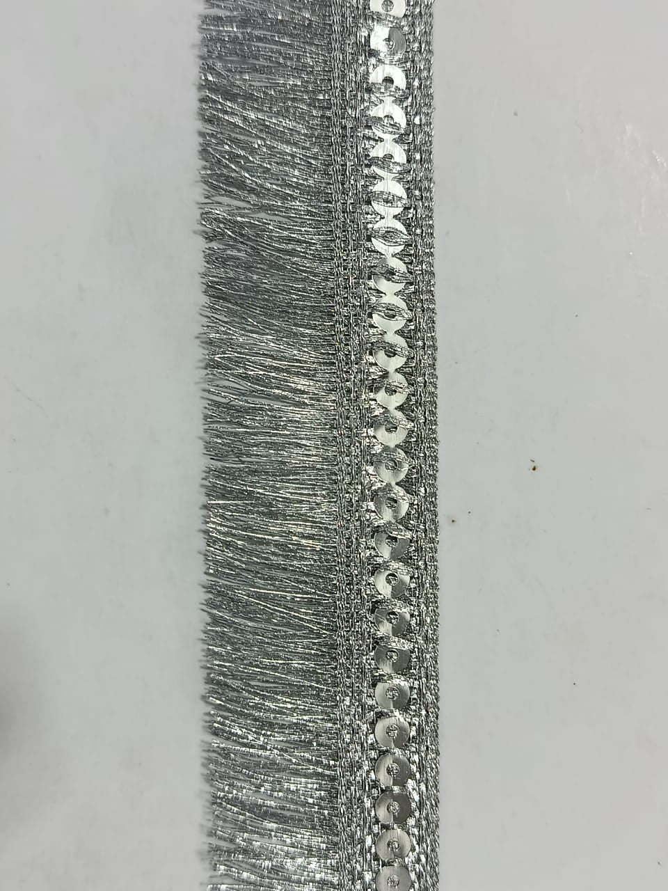 Frill Premium Metallic Sequin Fringe Lace. Available in 4 colours. Lace is available as per yard.