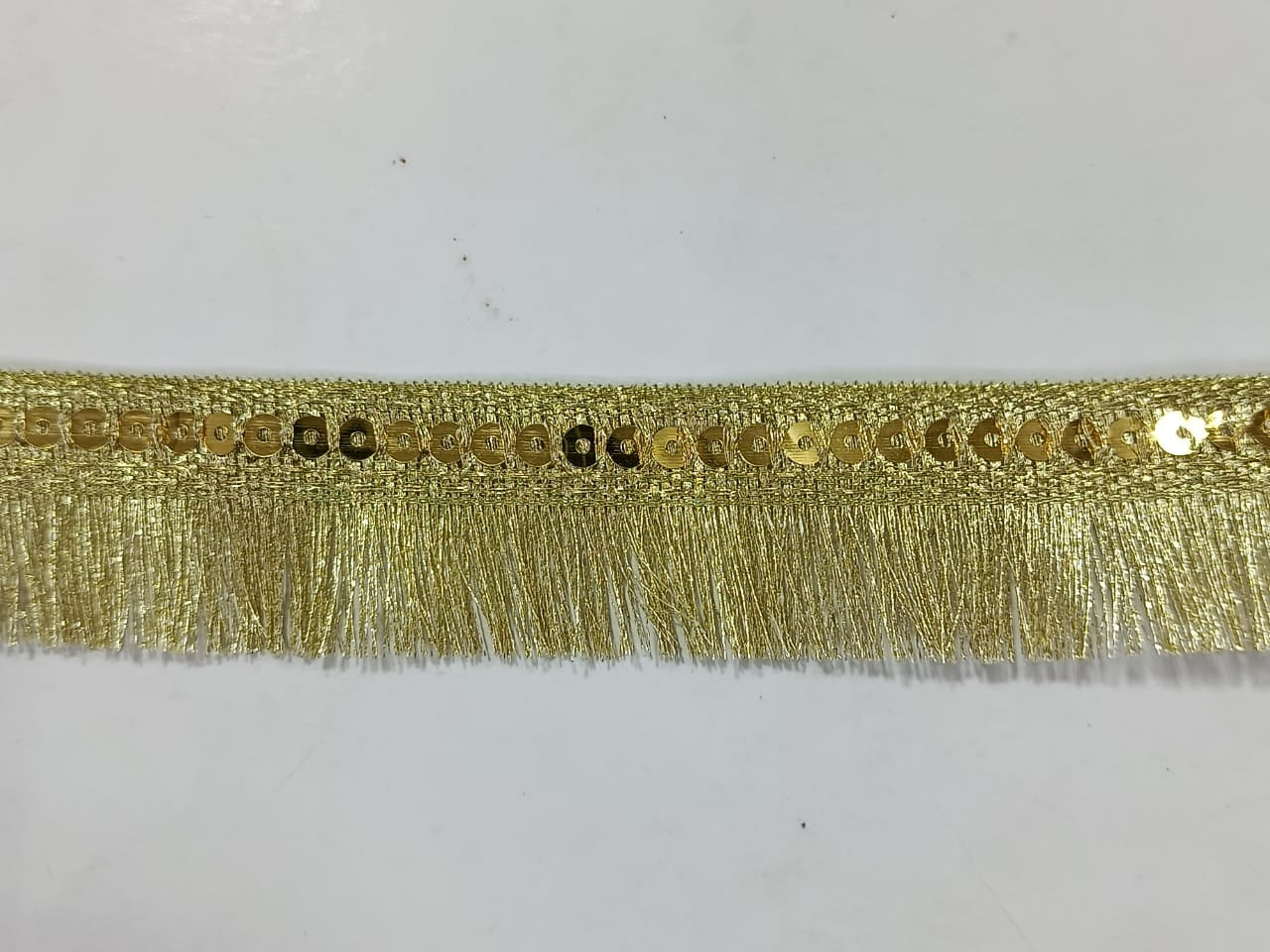 Frill Premium Metallic Sequin Fringe Lace. Available in 4 colours. Lace is available as per yard.