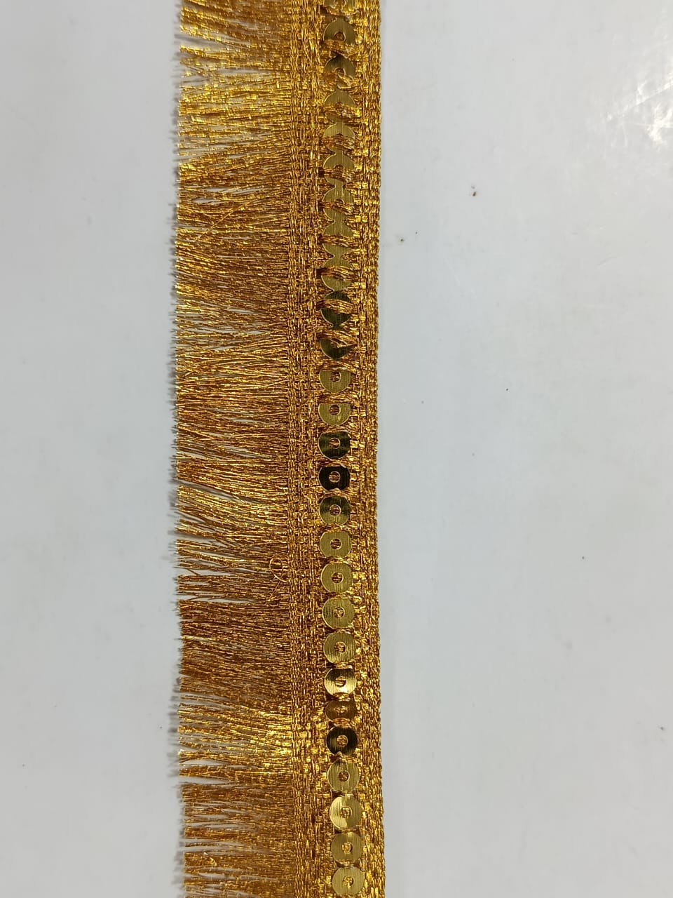 Frill Premium Metallic Sequin Fringe Lace. Available in 4 colours. Lace is available as per yard.