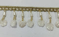 Elegant Pearl Drop Shell Fancy Lace. Lace size is approximately 1.15-1.25 Inches. Lace is available as per yard.