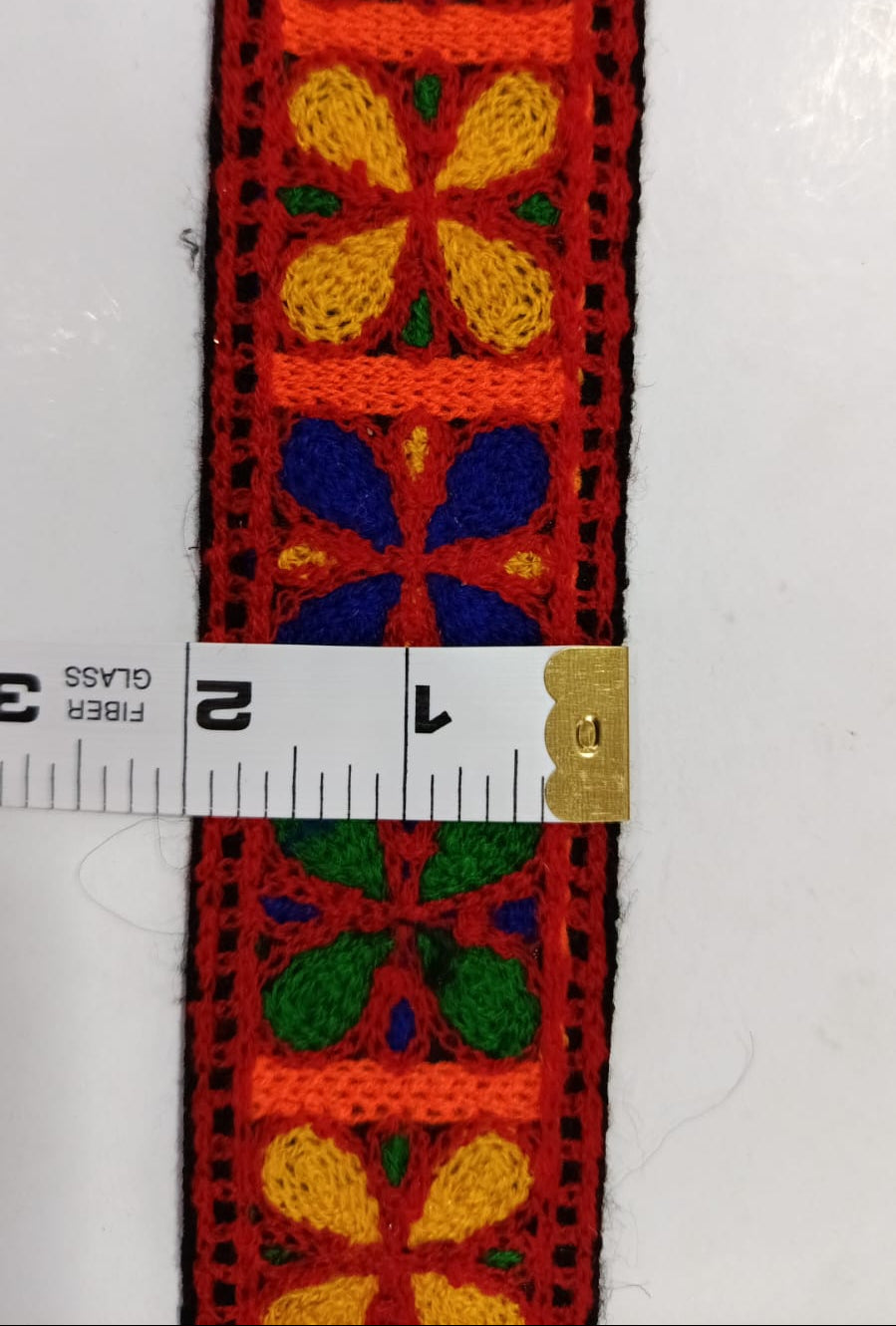 Multi-Colour Tape Lace. Lace size is approximately 1.95 Inches. Lace is available as per yard.