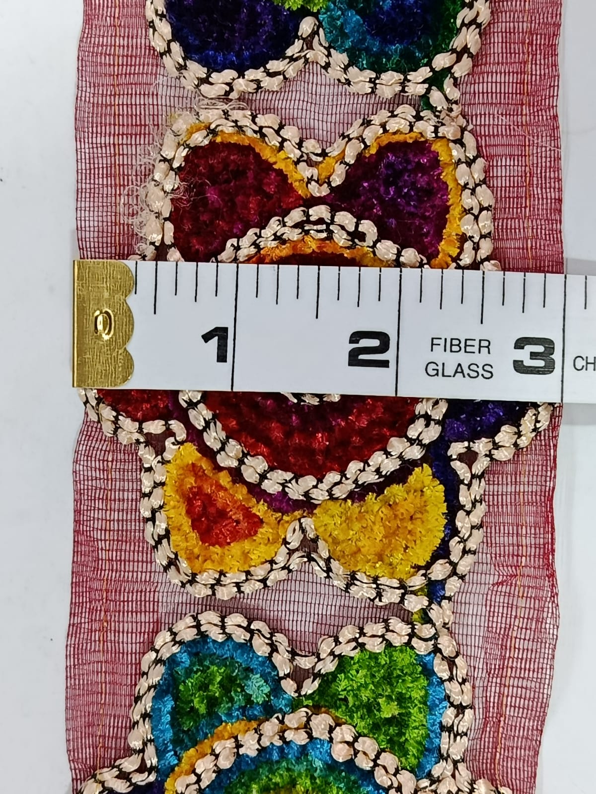 Multicolour Tape Lace. Lace size is approximately 2.85-3 Inces. Lace is available as per yard.