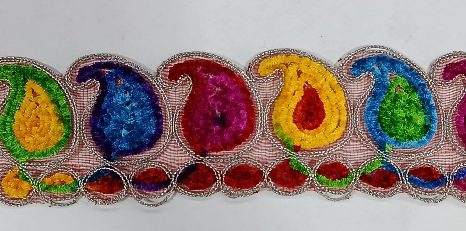 Multicolour Lace with Silver colour Outline. Lae is available as per yard.