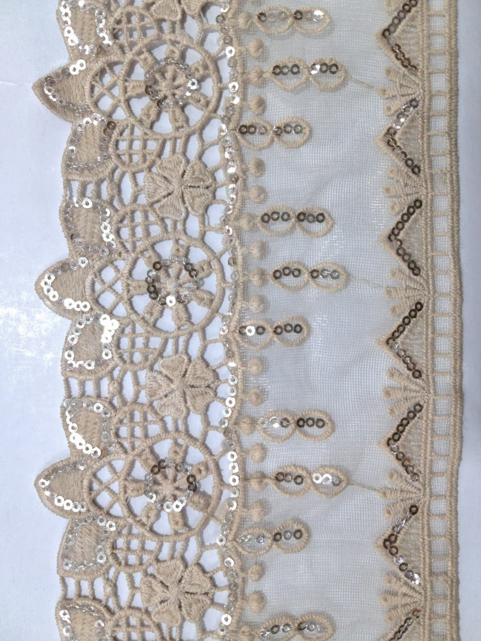 3D Fancy Sequence Milky White Lace. Lace sixe is approximately 4.25-4.5 inches. Lace is available as per yard.
