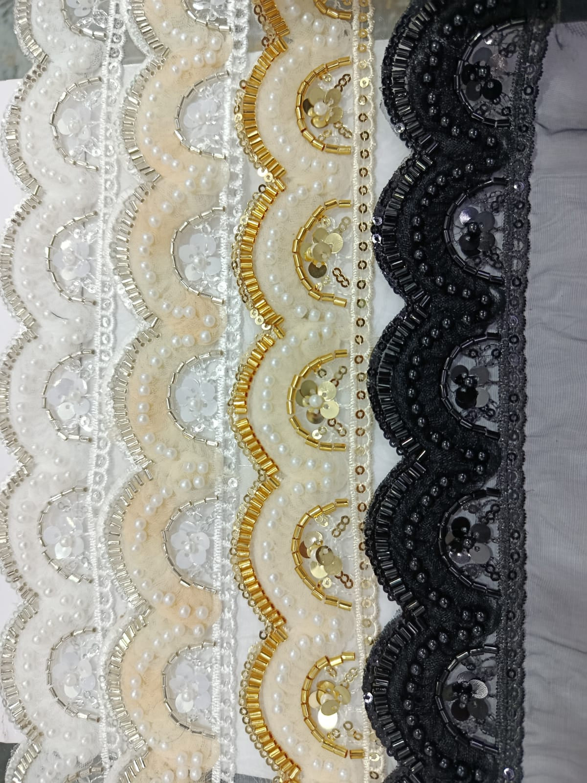 Fancy Pearl Stone Lace. Available in 4 colours. Lace is available as per yard.