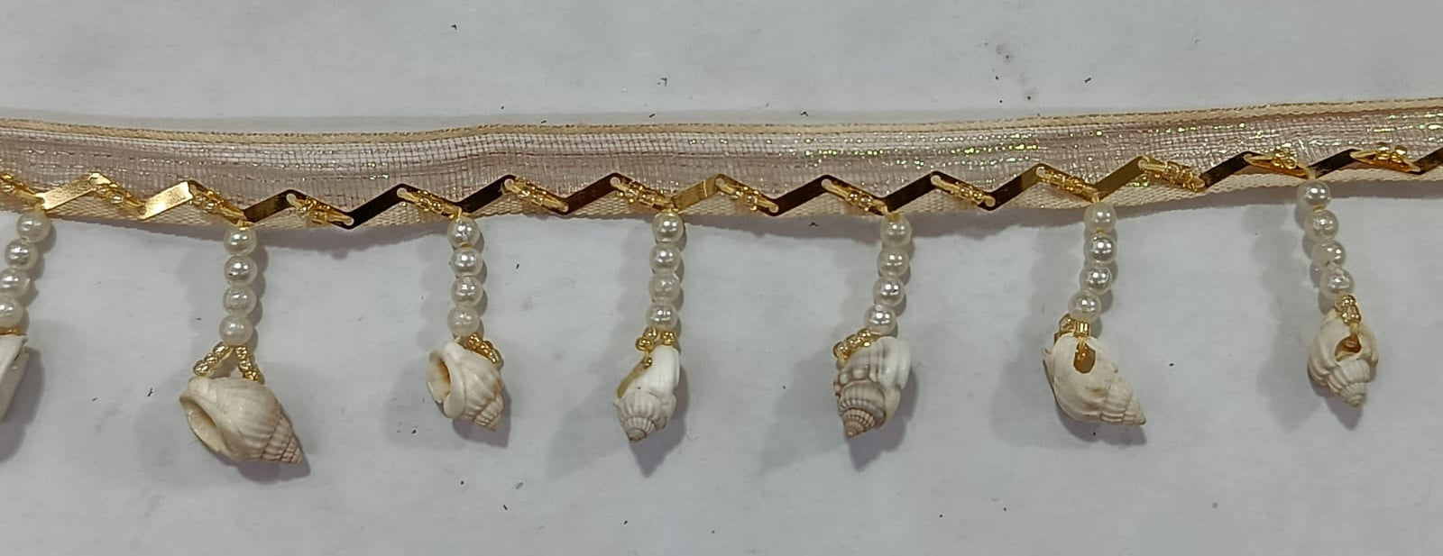 Elegant Pearl & Shell Decorative Lace. Lace Size is approximately 1.25-1.45 Inches. Lace is available as per yard.